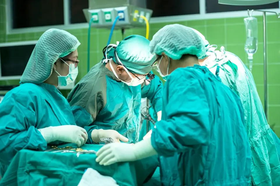 Hospital staff caring for a patient