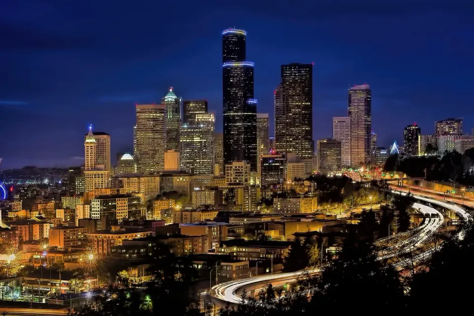 City buildings lit up at night
